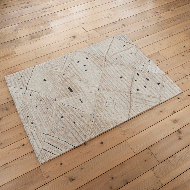 自由にスケッチしたような線のゆらぎと、遊び心あるドット柄が魅力のAMY RUG